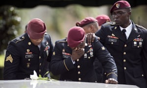 Members of the 3rd Special Forces Group, 2nd battalion cry at the tomb of US Army Sgt La David Johnson at his burial service 21October 2017 in Hollywood, Florida. Johnson and three other US soldiers were killed in an ambush in Niger on 4 October.