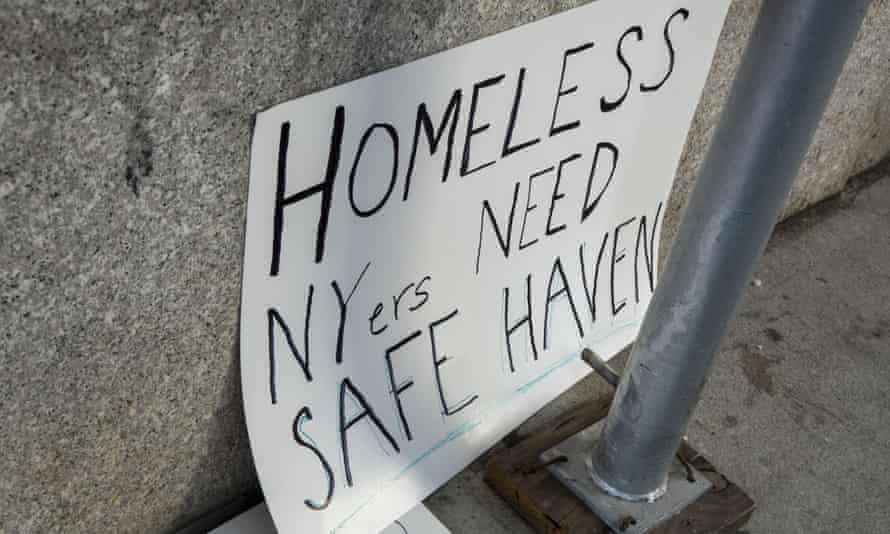 sign reading ‘Homeless NYers Need Safe Haven’