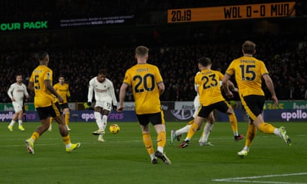 Marcus Rashford scores Manchester United’s opening goal against Wolves in the fifth minute.