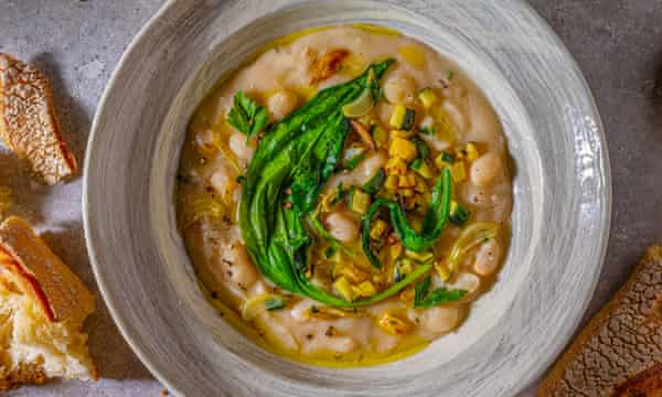 White bean soup with courgette and fresh herbs
