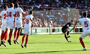 Harry Wilson takes a free kick.