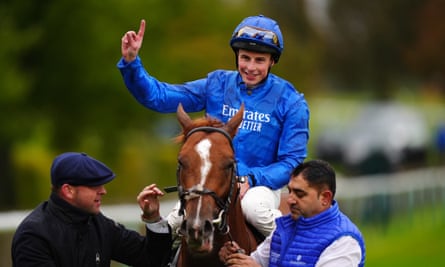 William Buick celebrates victory in the Dewhurst Stakes on board Shadow Of Light.