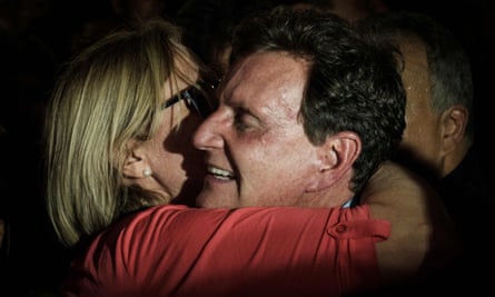 Marcelo Crivella embraces his wife, Sylvia Jane, after his election victory.