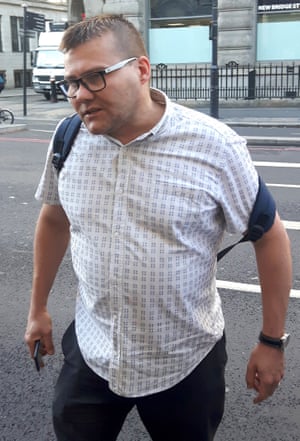 A man police wish to speak to after a pedestrian was shoved in front of oncoming traffic.