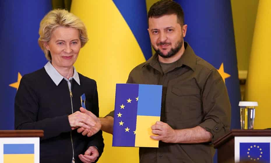 European Commission President Ursula von der Leyen shakes hands with Ukrainian President Volodymyr Zelenskiy