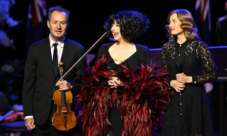 Richard Tognetti AO, Meow Meow and Satu Vanska perform during the State Memorial Service for Australian comedian and actor Barry Humphries at the Sydney Opera House in Sydney, Australia, 15 December 2023.
