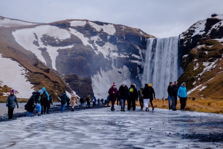 Skógafoss Waterfall In Skogar, IcelandA view of the Skógafoss Waterfall In Skogar, Iceland, on January 24, 2023. Skógafoss is one of Iceland’s biggest and most beautiful waterfalls with an astounding width of 25 meters (82 feet) and a drop of 60 meters (197 feet). (Photo by Manuel Romano/NurPhoto via Getty Images)