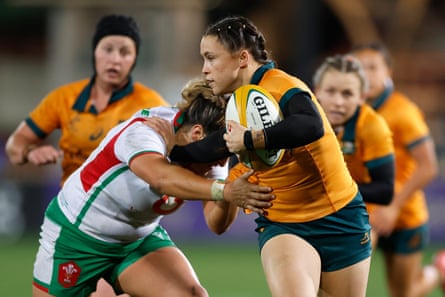 Desiree Miller takes on the Wales defence for the Wallaroos