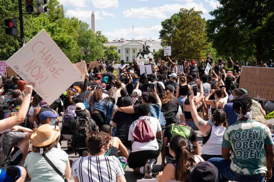Protesters gather outside the White House on Sunday.