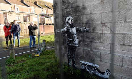The Banksy artwork appeared on the walls of a garage in Port Talbot.