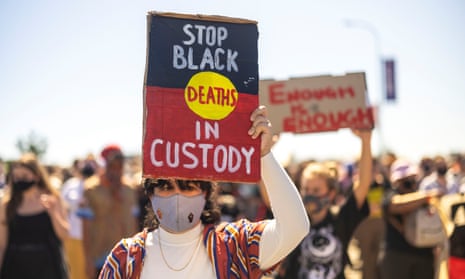 rally with Stop Black Deaths in custody sign