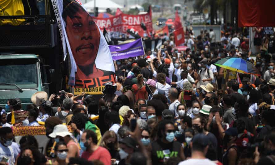 Protesters marching at the site of the killing in Rio de Janeiro.