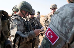 US and Turkish military forces conducting the third ground combined joint patrol inside the security mechanism area in northeast Syria, 4 October. The patrol allowed both militaries to observe first-hand progress on destroyed fortification that are a concern for Turkey
