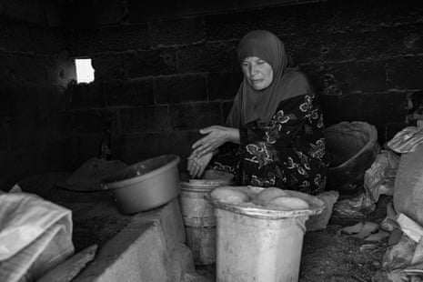 A women prepares bread