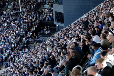 Fans in the new Riverside Stand watch Fulham take on Everton.