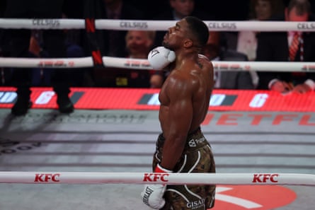 Anthony Joshua celebrates but his performance was far from impressive