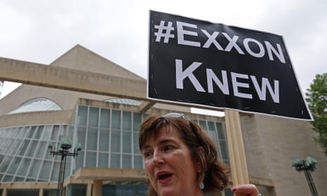 An activist protests outside Exxon Mobil’s annual shareholder meeting in Dallas in 2016. 