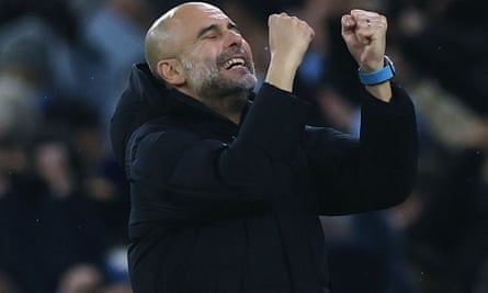 Manchester City manager Pep Guardiola celebrates as Manchester City put three past Nottingham Forest