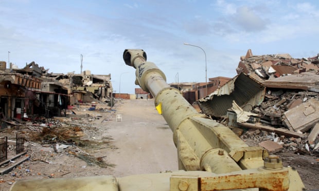 The barrel of a tank belonging to Libyan government forces is seen near the frontline of fighting with Islamic State militants in Sirte