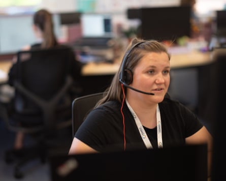 Senior helpline practitioner Kate Worthington speaks on the phone at The Revenge Porn Helpline, based in Exeter
