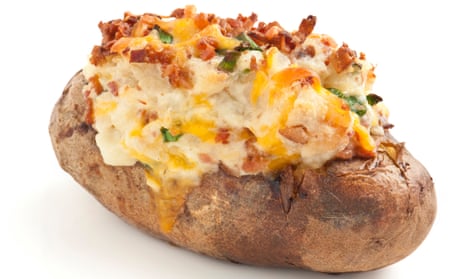 A jacket potato piled high with cheese and bacon filling.