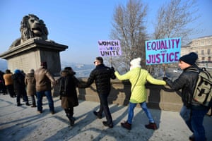 Protesters create a human chain on the Chain Bridge in Budapest, Hungary