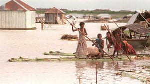 A family leaves their flooded home in Tangail, Bangladesh. ‘In a crowded world subject to such adverse shifts of climate, who would take care of such greenhouse refugees?’ says the film’s narrator.