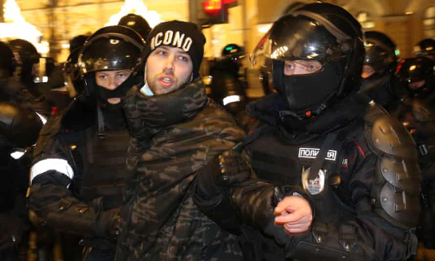 Police detain a protester in Moscow after the opposition leader Alexei Navalny was sentenced