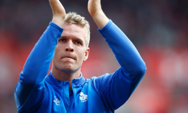 Jonas Lössl applauds Huddersfield fans after their final game of the season, a draw at Southampton when he sat on the bench.