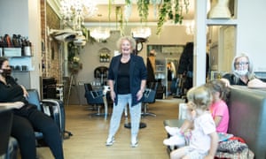 Natalie Power, owner of Dylan Robert Hair and Beauty, at her shop with her daughter, two grandchildren and staff.