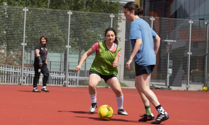 Two players on a football pitch