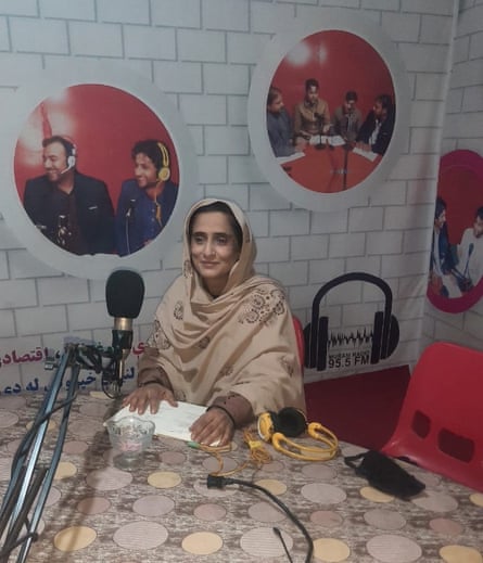 A woman in a radio studio.
