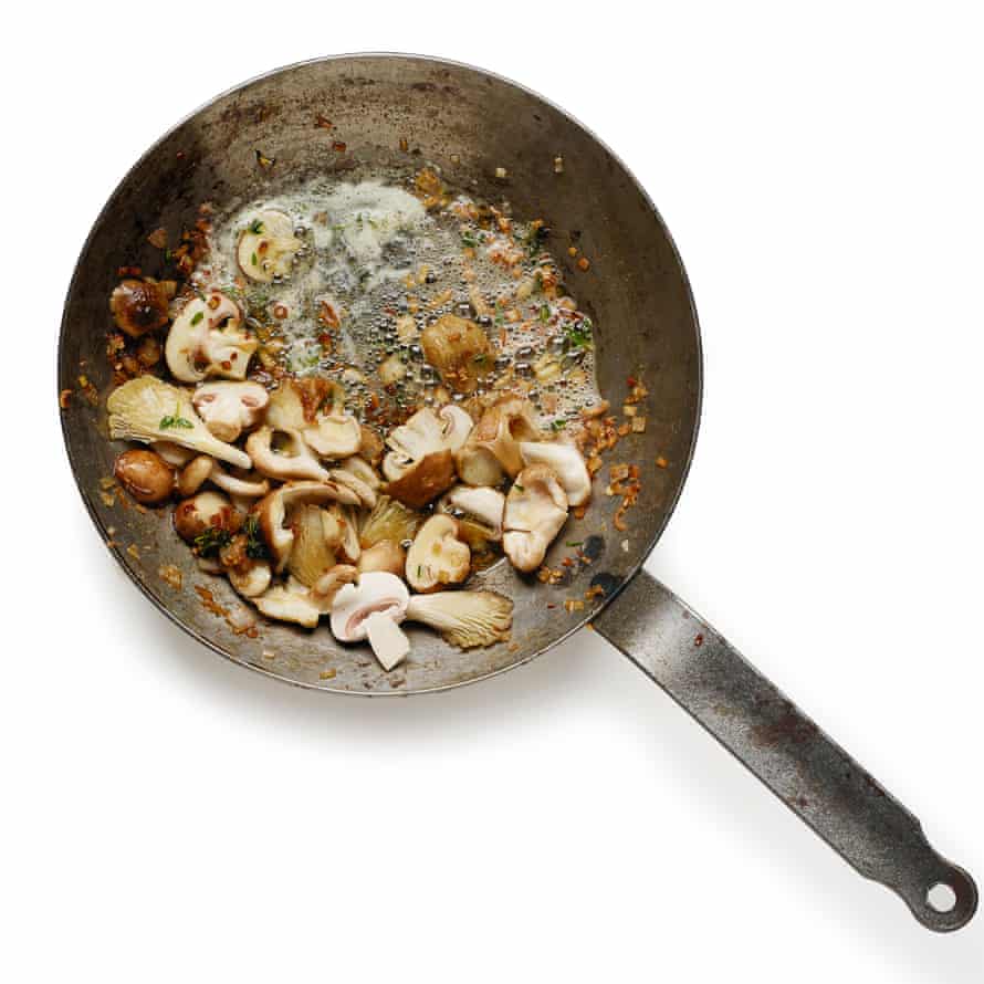 Sweat the shallots and mushrooms in butter until very soft, then deglaze with some madeira.