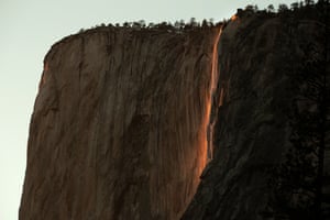 Yosemite, California, USFirefall at Yosemite national park in California. The event is caused when the setting sun makes Horsetail Fall near El Capitan appear to be on fire or look like a river of gold falling down the valley’s cliffs