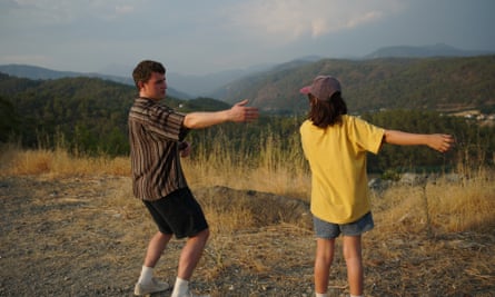 Man and woman dancing outdoors