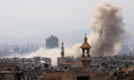 Smoke billows after a reported airstrike in rebel-held parts of Jobar, on the eastern outskirts of Damascus