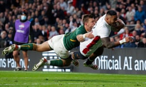 Englands Manu Tuilagi goes over to score the opening try of the the game.
