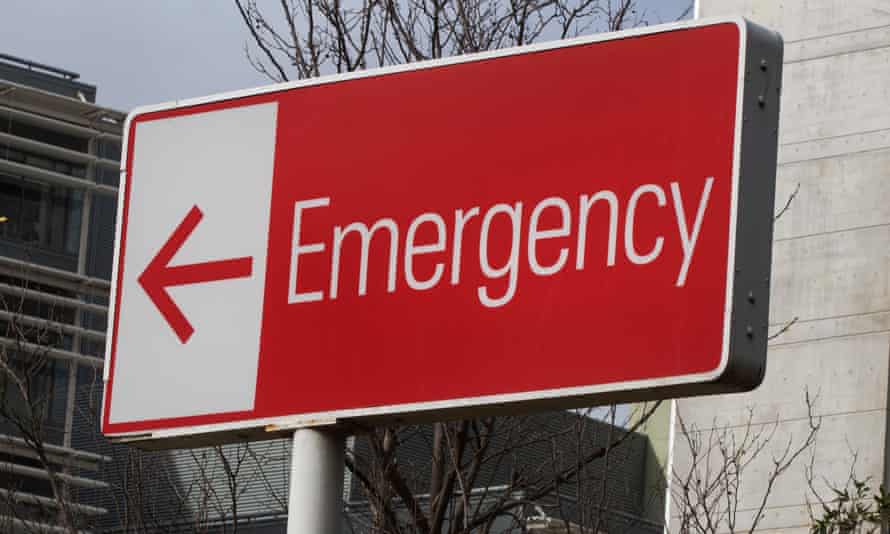 A sign points the way to a hospital emergency department
