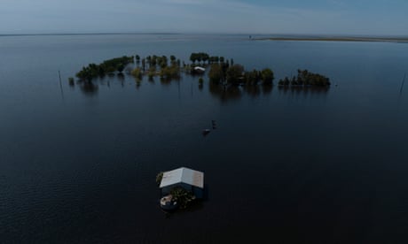 FILE - Farmland in the Tulare Lake Basin is submerged in water in Corcoran, Calif., April 20, 2023, after more than a dozen atmospheric rivers dumped record-setting rain and snowfall. Nearly half of the U.S. West has emerged from drought, but intense water challenges persist, scientists said Tuesday, May 9. (AP Photo/Jae C. Hong, File)