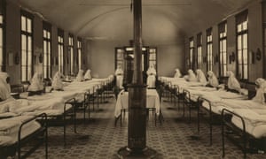 Patients lie in beds in a tuberculosis ward in Istanbul.