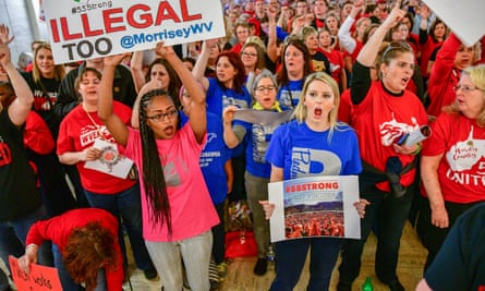 West Virginia teachers hold a rally. Teachers have gone on strike this year in Arizona, West Virginia and Oklahoma with varying degrees of success.