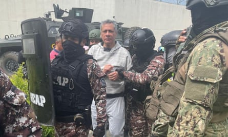 Police detain the former Ecuadorian vice-president, Jorge Glas in Quito.