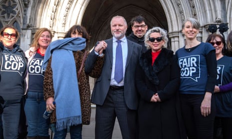 Harry Miller stands outside the high court with supporters, including the comedy writer Graham Linehan