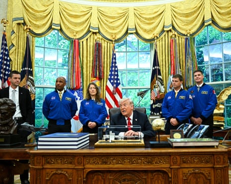 NASA astronauts meet with President Trump at the Resolute Desk in the Oval Office