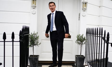 Jeremy Hunt leaves his home in London.