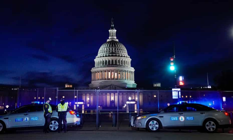 The US Capitol is seen behind heavy-duty security fencing on Thursday.