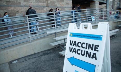 Parents and children line up for COVID vaccine shots in los angeles