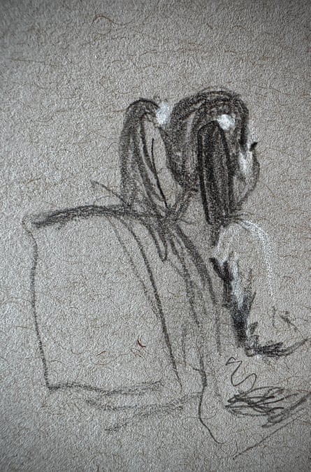 A young girl sits in court before an immigration judge listening to her family’s asylum hearing.