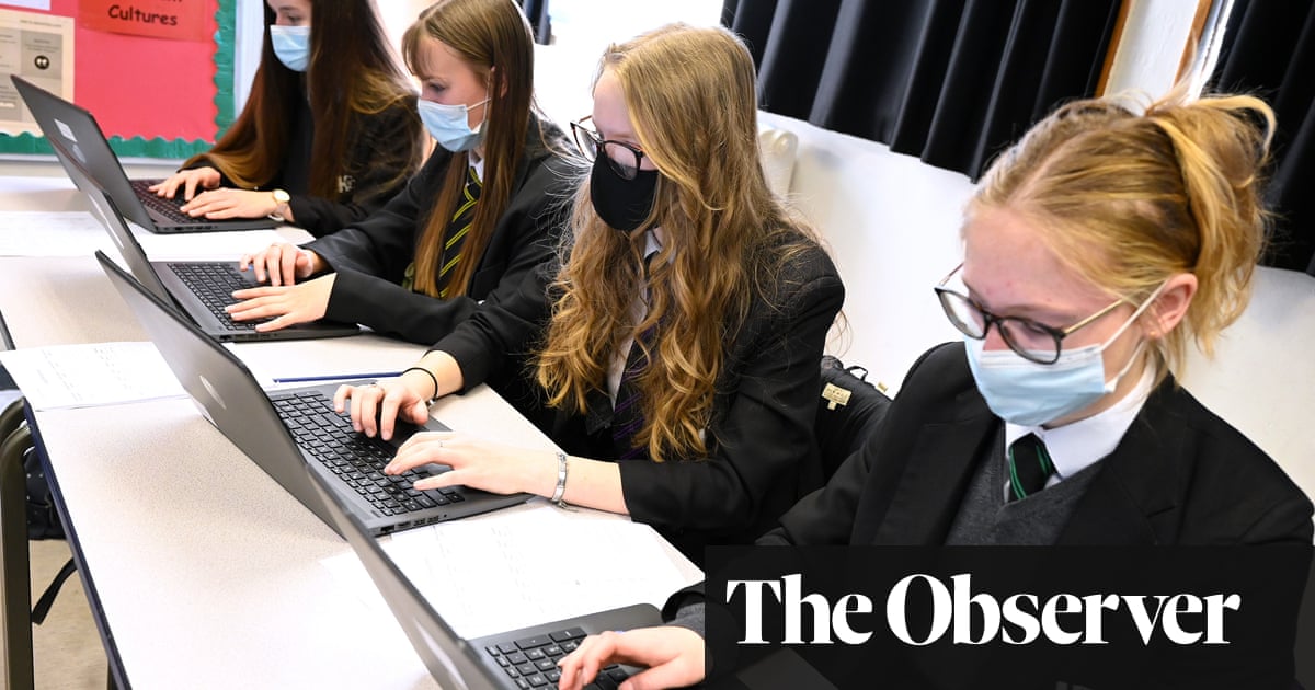 Schools in England reinstate mask wearing rules as Covid and absenteeism soar