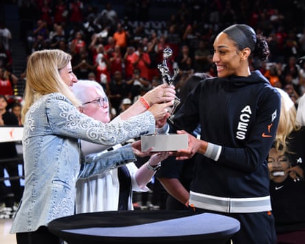 A’ja Wilson of the Las Vegas Aces receives the WNBA Most Valuable Player award from Engelbert.